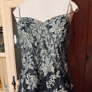 Jovani semi strapless formal gown.